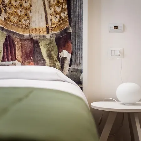 Couette-café Ferrara Rooms